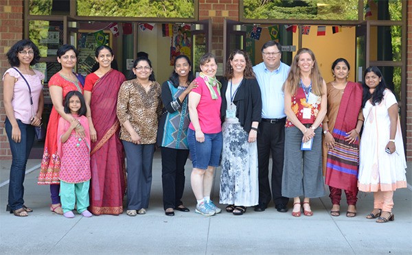 Art docents and Audubon Elementary School students with Redmond Mayor John Marchione at the school's International Night.