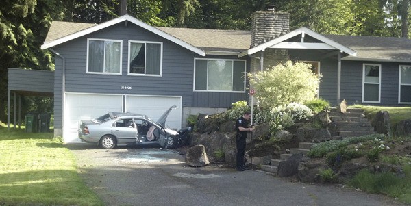 Investigators believe that speed was a factor in this single-car crash near a Redmond home Monday afternoon. The driver