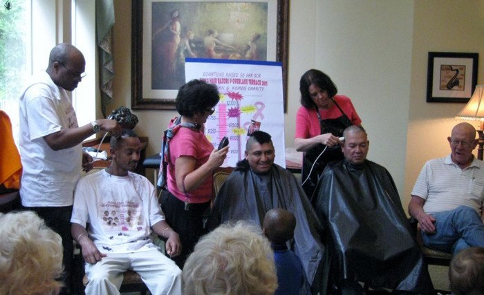 Volunteers get their heads shaved at the Overlake Terrace Assisted Living and Independent Living Shave a Thon to support breast cancer research. The event was part of a 'Passionately Pink for the Cure' fundraiser for the Susan G. Komen for the Cure.