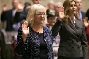 Rep.-elect Joan McBride is sworn in to the House of Representatives.