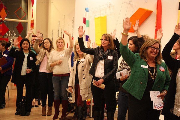 Attendees at Tuesday's Women In Business event participate in a short activity