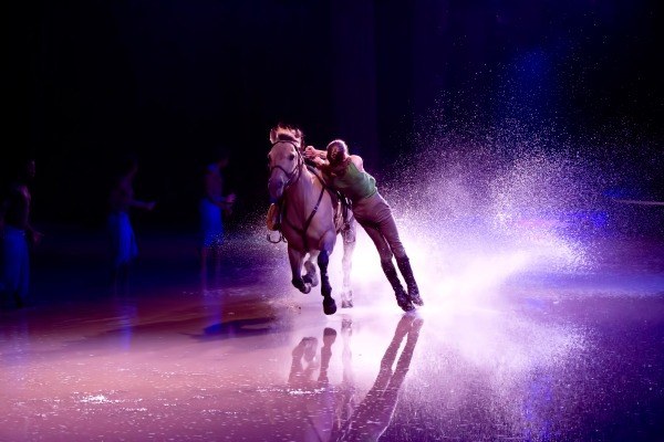 An ‘Odysseo’ speeding horse and fearless rider splash into the show’s finale during a recent performance. Montreal