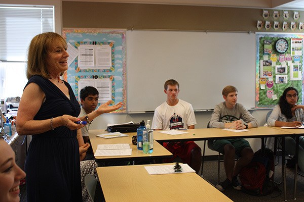 Marian Sugano and her students listen to another student during a class discussion. Sugano teaches Advanced Placement English Literature and Advanced Placement Spanish.