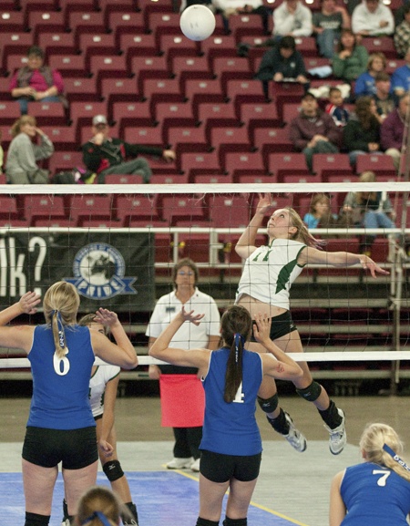 Bear Creek outside hitter Maddie Easley gets airborne as she goes up for a spike in the 5th/8th place consolation finals at the 2B state volleyball tournament at the Sun Dome in Yakima last Saturday. The Grizzlies lost the match 3-0 to Tekoa-Oakesdale to place eighth in their first state appearance.