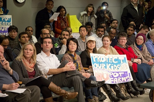 Redmond Ridge residents wait to address King County Council at Monday’s meeting.