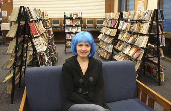 Shauna Yusko shows off her blue “Katy Perry” wig. The Evergreen Middle School librarian with stage three breast cancer said if she is going to wear a wig