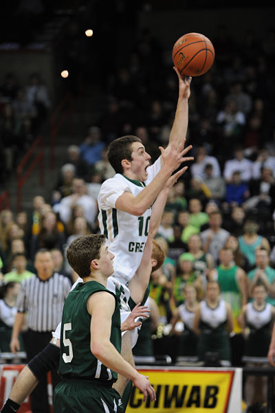 Bear Creek senior Collin Feight drives to the hoop during the state basketball tournament in Spokane.