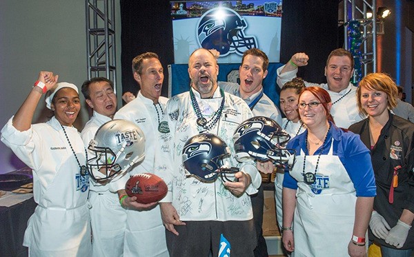 Redmond resident and chef John Howie (center) won this year's Kick Hunger Challenge at the Super Bowl. The challenge raised money to fight hunger throughout the country.