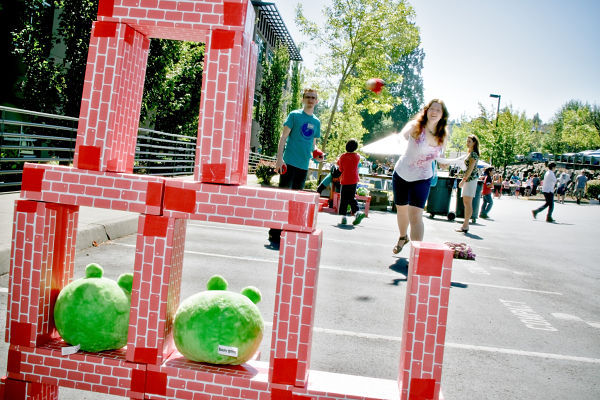 A young woman plays a life-sized game of Angry Birds at a past DigiPen Day. This year’s event will be Sept. 7 and celebrate the school’s 25th anniversary.