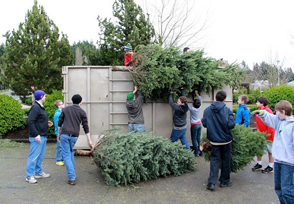 Redmond Boy Scouts have recycled Christmas trees for more than 16 years. They’ll do it again this weekend.