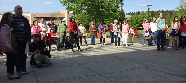 A crowd gathers today at the Bring Back Our Girls solidarity and prayer vigil at the Redmond City Hall commons. About 70 people attended the event for the 276 Nigerian girls who were abducted last month.