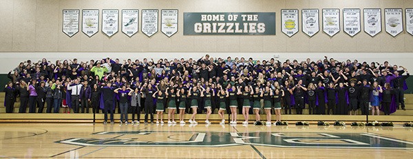 Here is a photo at the Feb. 6 spirit assembly of the entire Bear Creek upper school doing the “strong arm” pose in their purple capes going Strong Against Cancer (and in black in preparation for the Senior Night basketball game against Overlake).