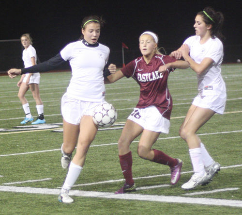 Redmond's Veronica Chung (left) takes control of the ball during Tuesday night's 1-1 draw with Eastlake.