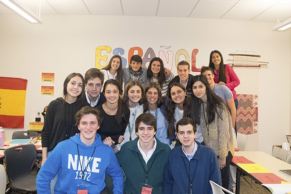 Building Bridges students pose in the Spanish classroom at Bear Creek’s new Upper School building. Front row