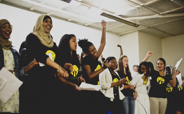 Girls in Y-WE are all smiles and have fun participating in a group activity.