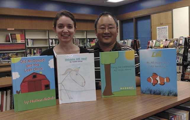 Librarian Shauna Yusko (left) and technology teacher Robert Kaneko at Evergreen Junior High School have received a $2