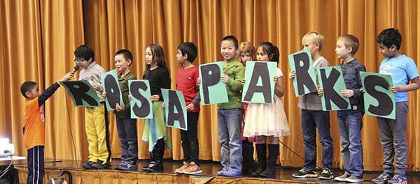 Students from Rosa Parks Elementary School on Redmond Ridge celebrate their namesake at a school assembly.