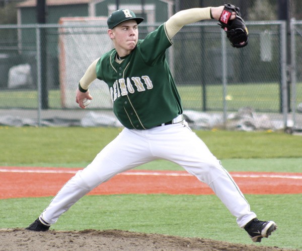 Mustang junior Peter Hendron works in relief of starter T.J. Whidby last night in the Mustangs' 4-3 loss to Skyline. The Spartans upset Redmond with a walk-off sacrifice fly in the bottom of the seventh inning.