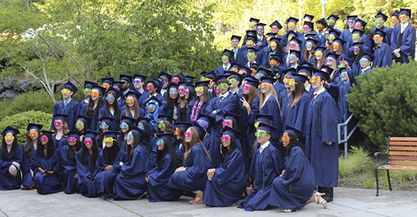 Tesla STEM High School graduates sport funky glasses at their recent commencement.