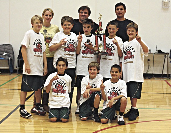 The Redmond Mustangs Juniors basketball team won the Mount Si Wildcat Tournament last weekend at Mount Si High School. Pictured front row