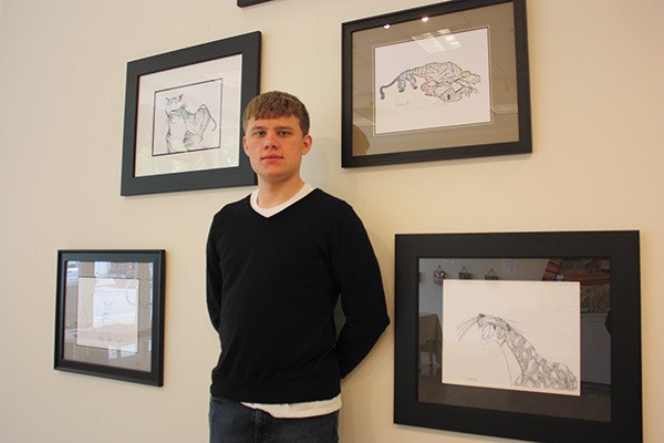 Austin Reichanadter’s art is currently on display at the VALA Art Center in Redmond Town Center. He especially enjoys drawing animals