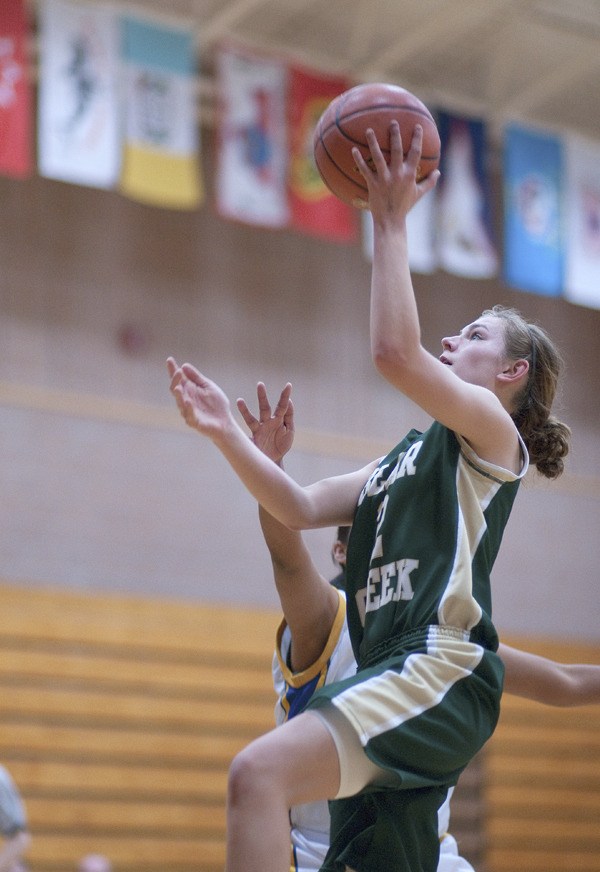 Freshman Kristina Engelstone goes up for a layin during Bear Creek's 50-19 rout of Chief Leschi last Friday. The next night