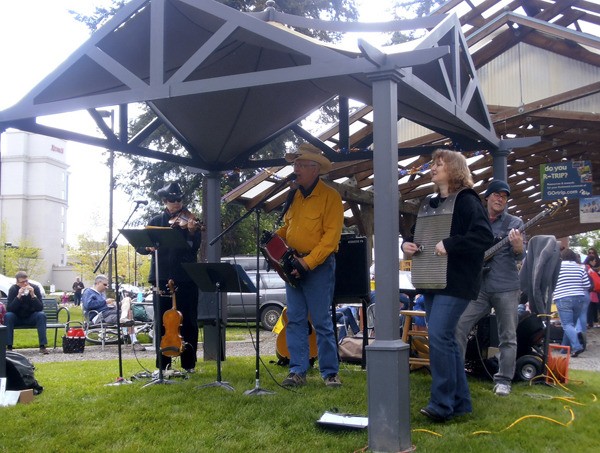 Soul Swamp entertained the crowd at opening day of the Redmond Saturday Market with its Louisiana folk music. The market runs every Saturday through Oct. 27 at the corner of Leary Way Northeast and Bear Creek Parkway.