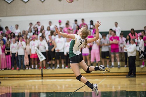 Bear Creek's Gracie Matthews serves during the Dig Pink volleyball match.