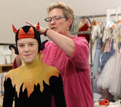 It's costume-fitting time for Caelen Wisont.