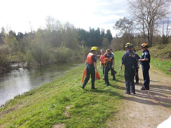 Firefighters gear up for a recent water rescue along the Sammamish River.