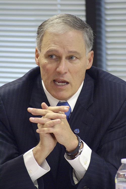 Gov. Jay Inslee discusses the revenue portion of his proposed budget with Reporter staff members last month.