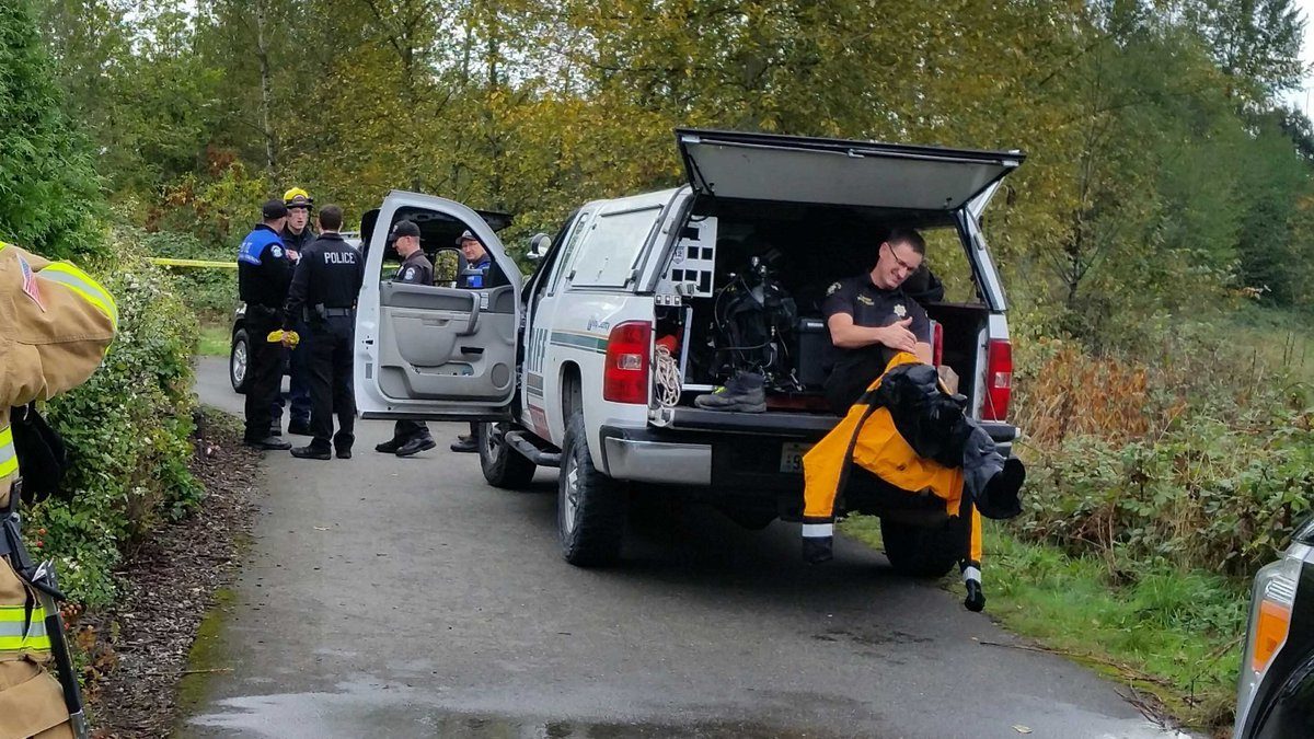 Members of the King County Sheriff’s Office Marine Rescue Unit and Redmond Police Department recovered a deceased body on Sunday in a Redmond retention pond. Courtesy of the Redmond Police Department