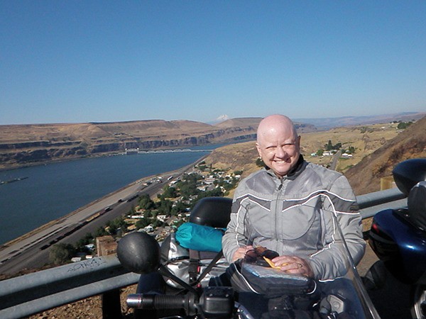 Laurel Macartney is all smiles during a motorcycle ride to the Columbia River Gorge by Hood River.