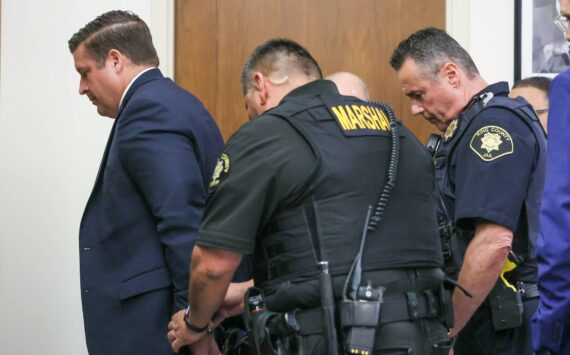 Auburn Police Officer Jeffrey Nelson is escorted out of the courtroom following the guilty verdict at his murder trial June 27, 2024. (Ken Lambert / The Seattle Times / Pool)